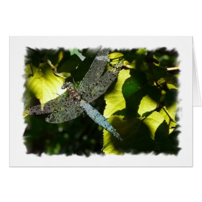 Blue Mosaic Dragonfly against sunlit leaves Greeting Card by avisnoelledesigns