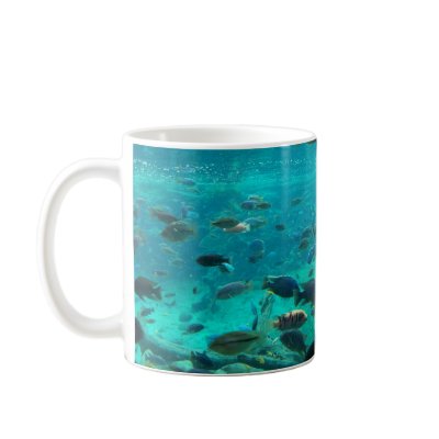 Blue pool of cichlids swimming around design coffee mugs by SusansZooCrew