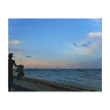 Blue seascape with silhouette of boy running gallery wrapped canvas