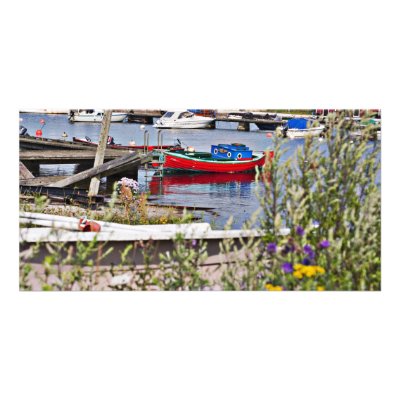 Boats docked in small harbour by arnet17
