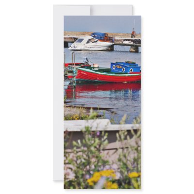 Boats docked in small harbour by arnet17