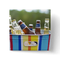 Bottles of beer in ice bucket buttons