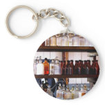 Bottles of Chemicals on Shelves Keychain