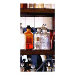 Bottles of Chemicals on Shelves Picture Card