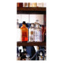 Bottles of Chemicals on Shelves Picture Card