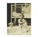 Boy holding teddy bear postcards
