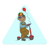 Boy on Scooter with Balloon