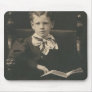 boy reading book mousepad