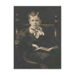 boy reading book post card