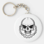 Brass knuckles skull keychain