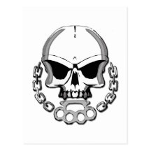 Brass knuckles skull postcard