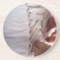 Bridesmaid hand lacing wedding dress photograph