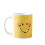 Bright yellow smiley coffee mug