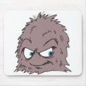brown hairy furry monster mousepads