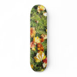 Brown Leaves Laying On The Grass Skateboard Decks