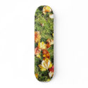 Brown Leaves Laying On The Grass skateboards