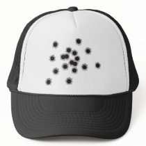 Bullet holes from a rifle or gun, possibly shotgun hats