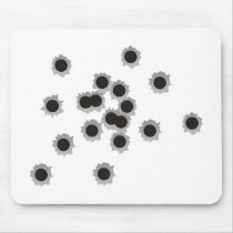 Bullet holes from a rifle or gun, possibly shotgun mousepads