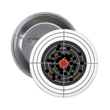 Bullet holes in target - but not the bulls-eye! pin