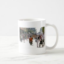 Busy street in Katakolon Greece Mugs