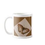 Butterfly in brown and gold mugs