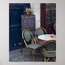 Cafe table with cane chairs in Paris, France Posters