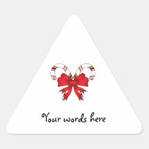 Candy canes with red ribbon stickers