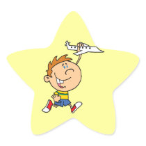 cartoon boy playing with toy aeroplane star sticker