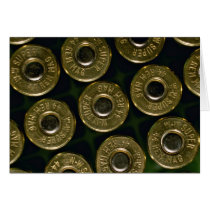Cartridges, .44 magnums in carrier, detail of cap greeting cards