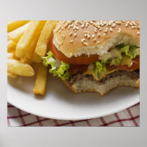 Cheeseburger, bites taken, with chips posters
