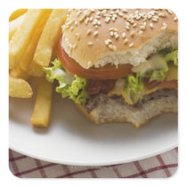 Cheeseburger, bites taken, with chips sticker