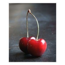 Cherries barely attached at the stem photo