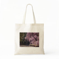 Cherry Blossoms On Trees Over Water Bags
