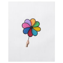 Child hand holding a pinwheel full colour flyer