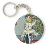 Child Riding Horse on Wheels on Xmas Day keychains