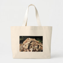 Chopped Wood Pile Outside Canvas Bags