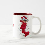 Christmas girl hugging mugs