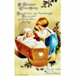 Christmas greeting with a child in a caddle and th photo sculptures