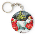 Christmas greeting with children playing around th keychains