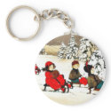 Christmas greeting with kids snow slading keychains