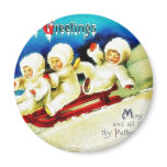 Christmas greeting with three kids snow slading magnets