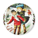Christmas greeting with two kids snow slading in a magnets