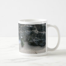 Christmas Tree In Front Of Rocks.jpg Mugs