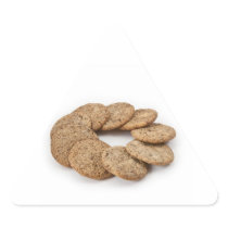Circle of cookies on a white background triangle sticker