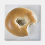 Close-up of a bagel fridge magnet