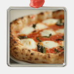Close-up of a whole pizza pie christmas tree ornaments