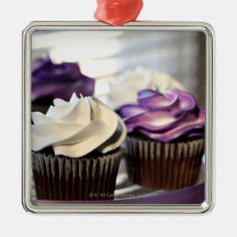 Close-up of cupcakes with selective focus on christmas ornaments