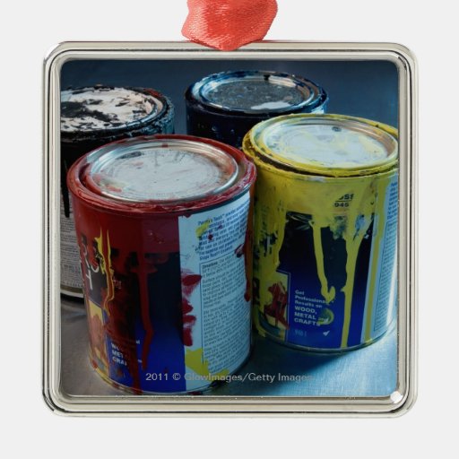Close-up of four paint cans ornament