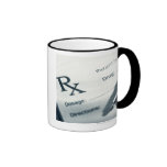Close up of prescription pad and pen mugs
