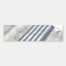 Close-up on a tyre traces in the snow bumper sticker